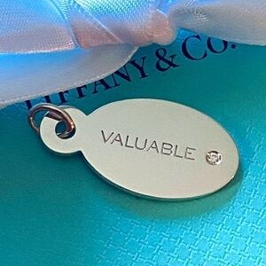 Tiffany & Co “valuable” diamond oval disk charm 925 unused w/box limited w/ box
